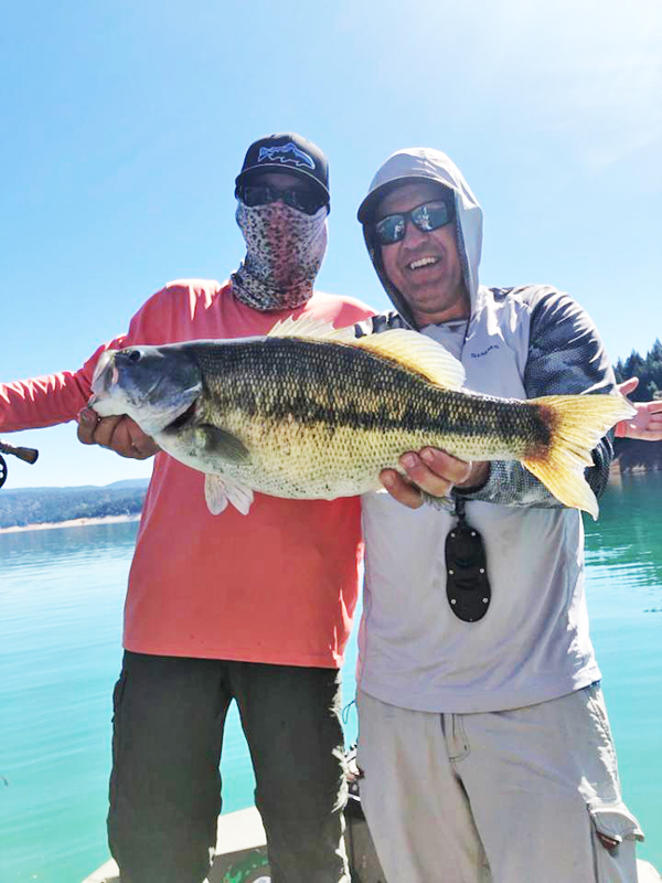 Spotted bass fly fishing with friend near Nevada City, CA